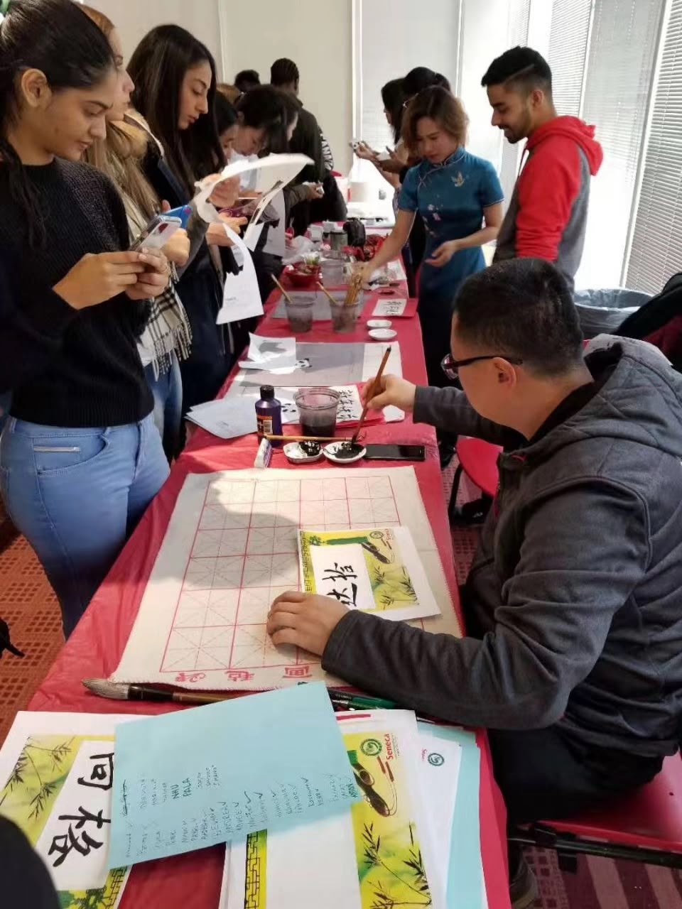Calligraphy workshop at a Seneca cultural event